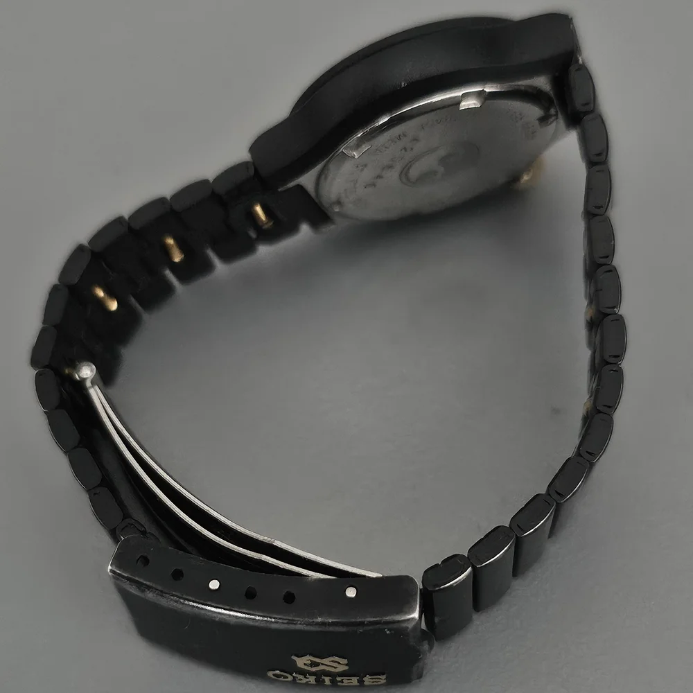 Seiko Black and Gold Quartz Sports Watch